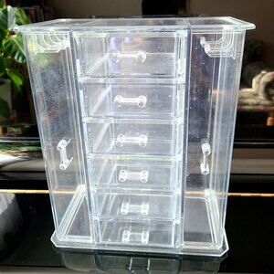 Large acrylic jewelry organizer with 6 drawers and necklaces holders.